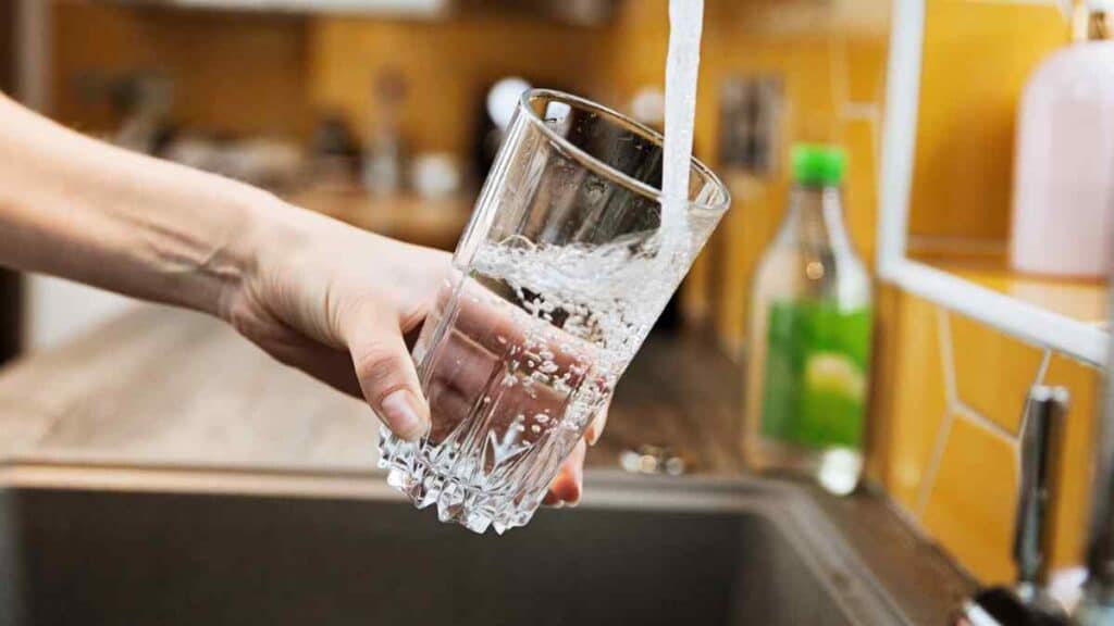 Glass of water for infant formula.