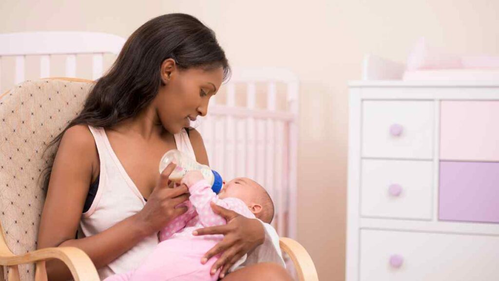 Mother taking care of her infant.