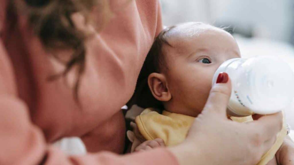 Baby drinking an infant formula.