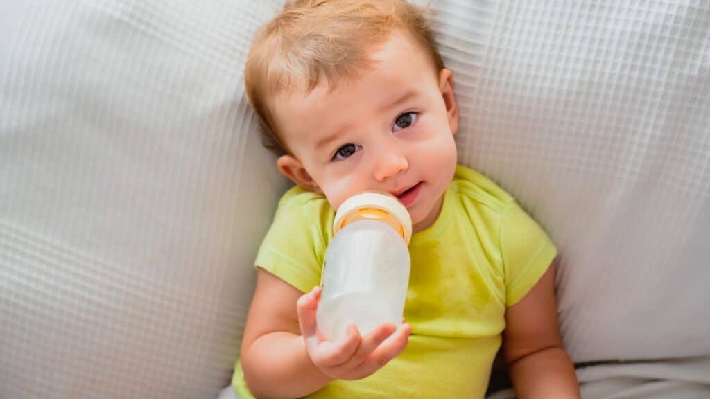 A drinking baby with the right amount of formula.