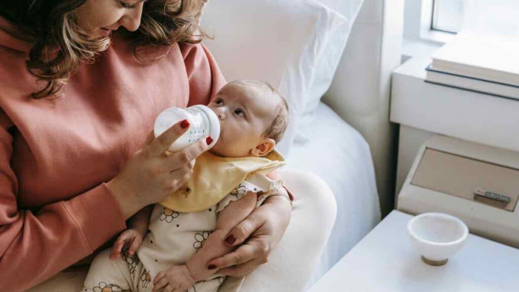 Mother feeding baby.