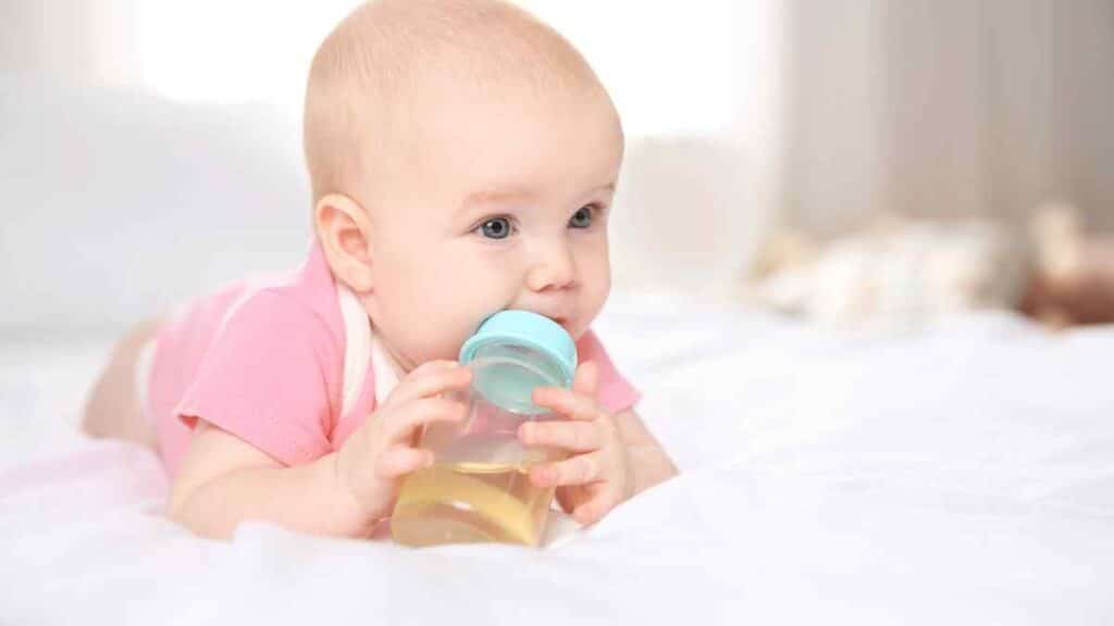 Baby drinking water.