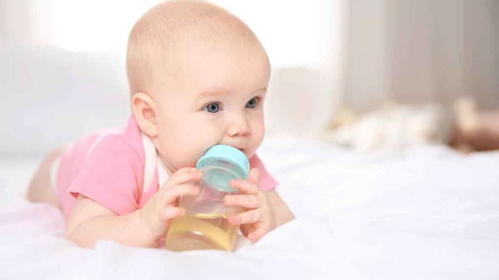 baby drinks on her bottle