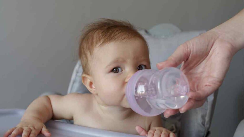 Baby drinking water.