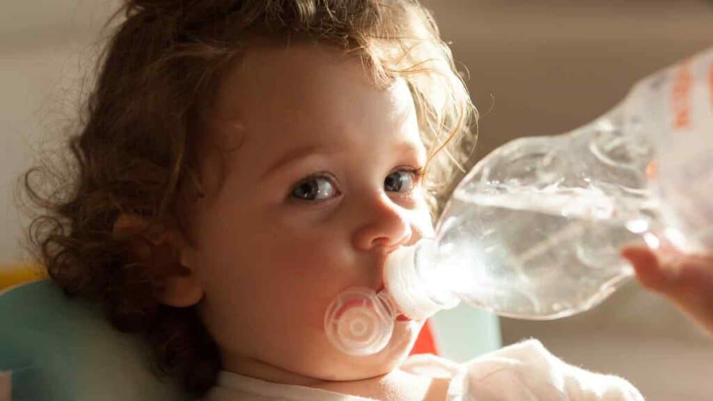 Baby drinking water.