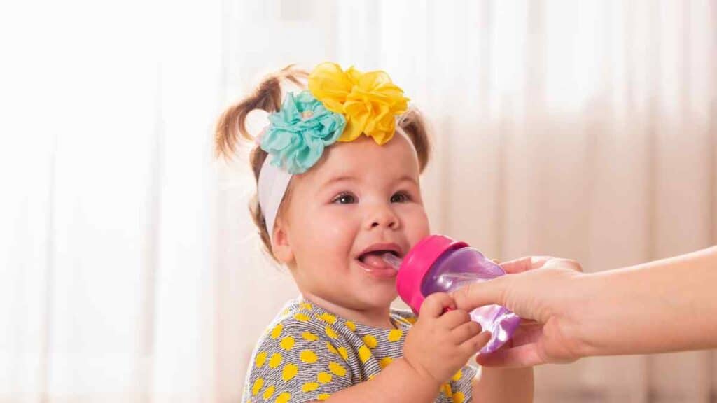 Infant girl with a headband.