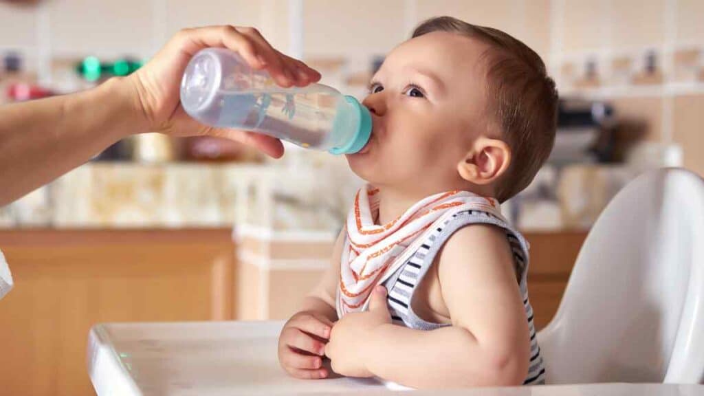 Baby drinks water